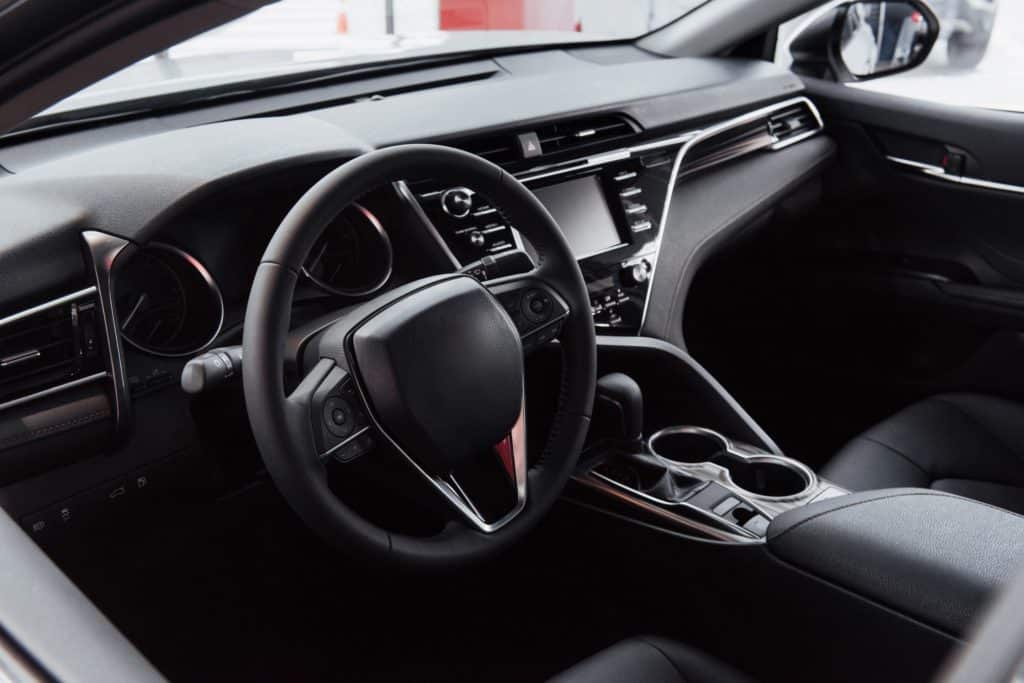 View of the interior of a modern automobile showing the dashboard